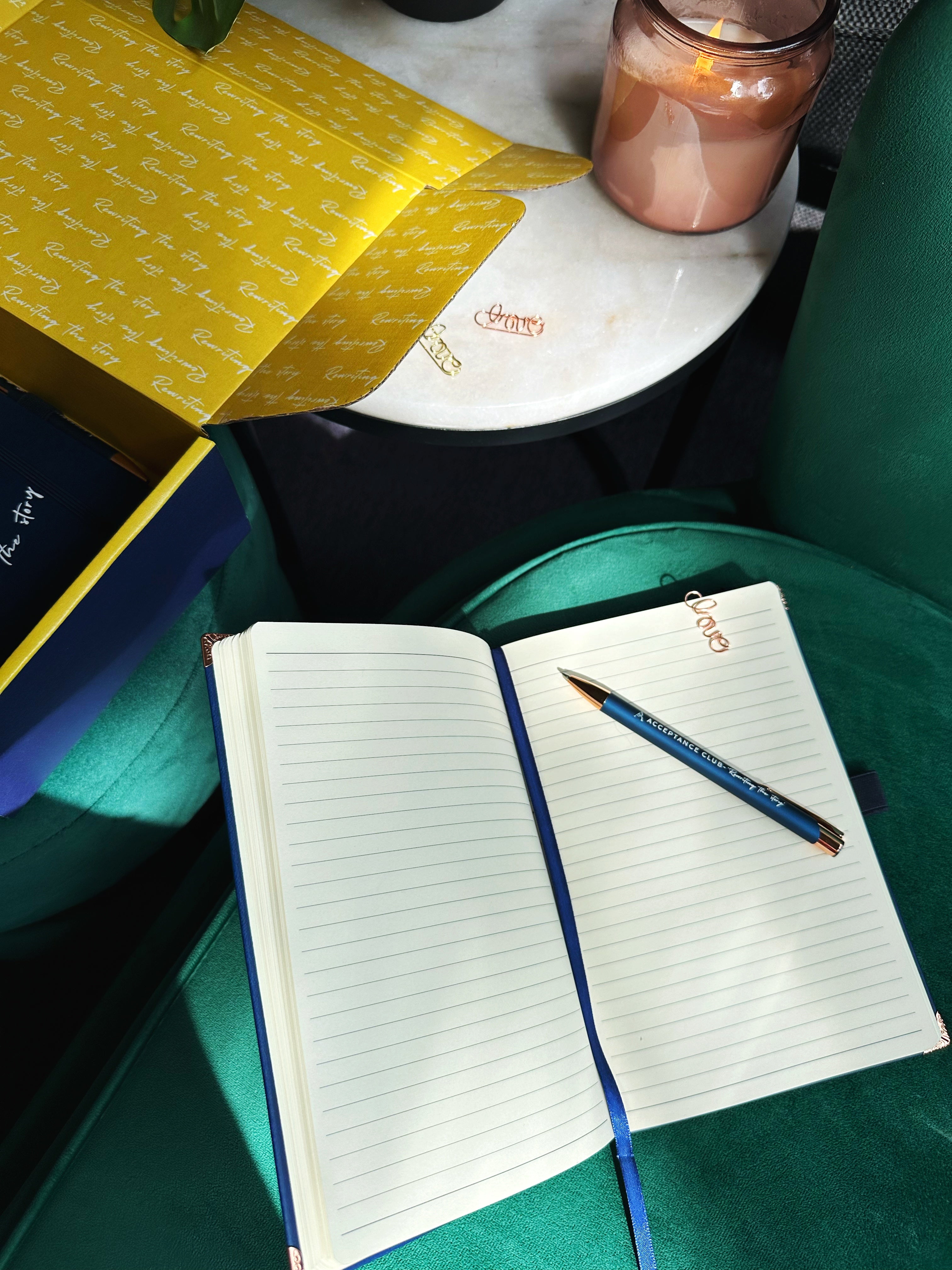 open journal with lined pages for the Acceptance Club